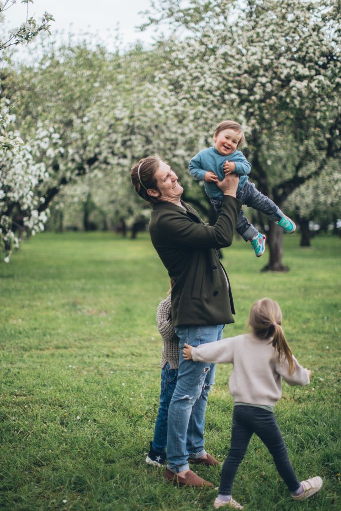 Father With his Children at a Park